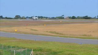 Plane landing at Guernsey Airport