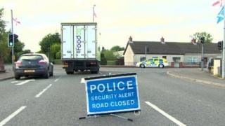 Police closed the Moira Road while officers carried out searches