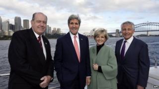 Australian Foreign Minister Julie Bishop (2nd R) with US Secretary of State John Kerry (2nd L), US Secretary of Defence Chuck Hagel (R) and Australian Defence Minister David Johnston (R) in Sydney on 12 August 2014