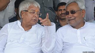 Lalu Prasad Yadav (left) says his alliance with Nitish Kumar (right) will defeat the BJP