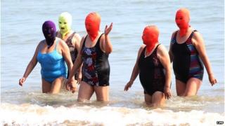 Picture of women at Qingdao wearing Face-kinis.
