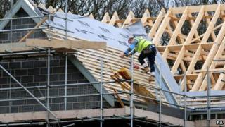 A builder working on a new house