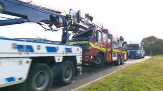 The fire engine being recovered