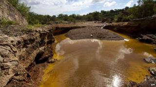 View of a water drain in the surroundings of the Buenavista copper mine on August 13, 2014