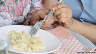 Elderly person receiving help at home