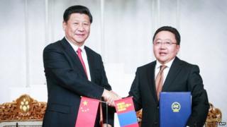 Chinese president Xi Jinping (left) met his Mongolian counterpart Tsakhiagiin Elbegdorj on Thursday