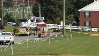 A Campbellsville Fire Department truck with the ladder extended remained at the scene where two firefighters were injured during an ice bucket challenge during a fundraiser for ALS in Campbellsville, Kentucky 21 August 2014