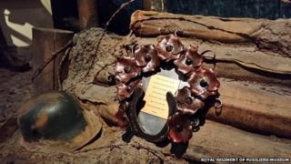 Ironwork wreath and a WW1 helmet