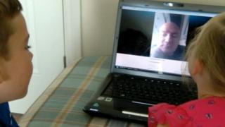 Kristian Nicholson speaks to his family over Skype