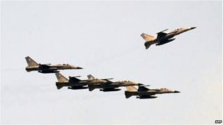 Taiwan's Indigenous Defence Fighters (IDF) fly in formation at Ching Chuan Kang Air Base (CCK) on 17 July 2014