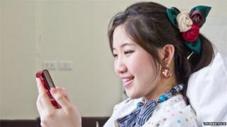 Woman chatting on her mobile