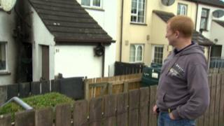 Louis O'Neill surveys the damage to the front of his property in Mullacreevie Park, Armagh