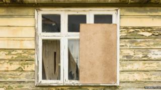 Boarded window