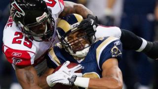 An Atlanta Falcons defender tackles a St Louis Rams player in a game in November 2010.