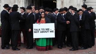 Samira Hamidi protesting outside Cardiff City hall