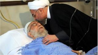 Iranian President Hassan Rowhani (R) visits Iranian supreme leader Ayatollah Ali Khamenei in hospital after a surgery in Tehran, Iran on 8 September 2014.