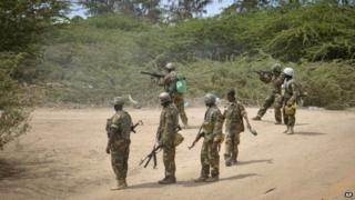 African Union (AU) soldiers from Uganda fire at al-Shabab positions in the Lower Shabelle region of Somalia on 30 August 2014