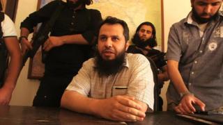 Hassan Abboud (seated) and members of the Islamic Front