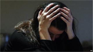 Generic picture of woman in despair