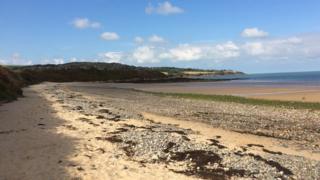 Traeth yr Ora near Moelfre on Anglesey , which is criss-crossed by the Anglesey Coastal Path