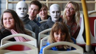 Actors dressed as aliens