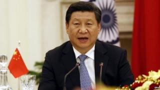 Chinese President Xi Jinping reads a statement after a meeting with Indian prime minster Narendra Modi at Hyderabad house in New Delhi, India, 18 September 2014