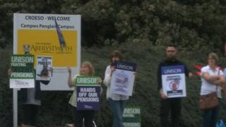 Staff take part in a walk-out at Aberystwyth University