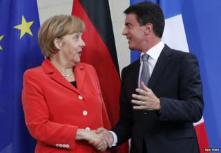 German Chancellor Angela Merkel with French PM Manuel Valls (22 Sept)
