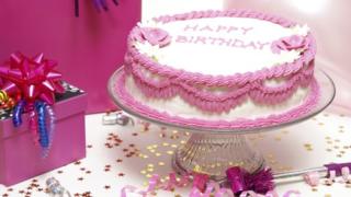 Birthday cake and balloons