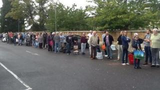 People queuing for water