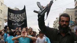 Supporters of al-Nusra Front protest in Aleppo, Syria. 26 Sept 2014