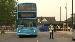 Police cordon around a bus