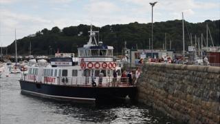 Passengers leaving the Herm Travel Trident at the Cambridge Steps in St Peter Port Harbour, Guernsey