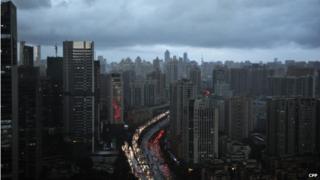Dark clouds cover the city's skyline on 22 May 2014 in Guangzhou, Guangdong Province of China