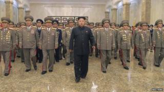 North Korean leader Kim Jong Un (C) visits the Kumsusan Palace of the Sun to pay tribute to founding President Kim Il Sung and former leader Kim Jong Il to mark the 61st anniversary of the victory of the Korean people in the Fatherland Liberation War, in this file photo released by North Korea's Korean Central News Agency (KCNA) in Pyongyang 27 July 2014