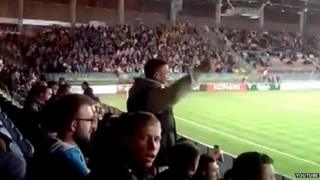 Fans chant at the Ukraine-Belarus Euro 2016 match in Borisov, Belarus, on 9 October 2014