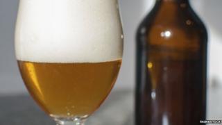 Beer glass and bottle