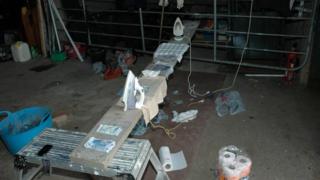 Police found irons, bleach and stolen banknotes stained with dye