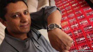 Ithichanda Ponnappa shows off an HMT watch