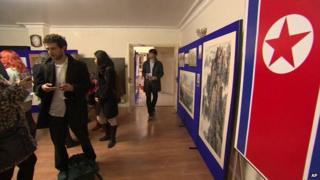 A North Korean flag hangs from the wall at a public art exhibition at the North Korean embassy