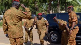 Lt Col Isaac Zida (centre) in Ouagadougou. Photo: 4 November 2014