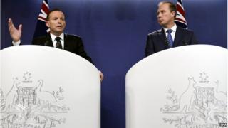 Australian Prime Minister Tony Abbott (L), and Australian Health Minister Peter Dutton (R) during a press conference in Sydney, Australia, 5 November 2014.