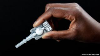 Close up of hand holding the Sayana Press contraceptive device