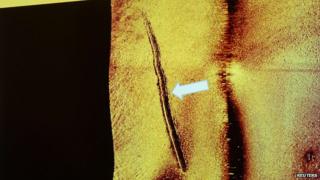 Sub-sea tracks left behind by a mini-submarine is seen in this undated sonar image
