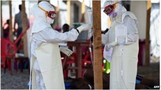 Red Cross workers at an Ebola clinic in Sierra Leone (15 Nov 2014)