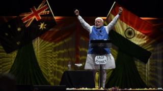 Prime Minster of India Narendra Modi acknowledges thousands of supporters at the Allphones Arena Olympic park in Sydney on November 17, 2014
