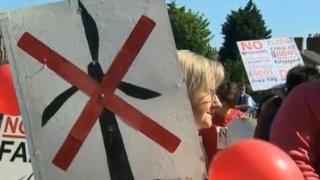 Hundreds protested in Welshpool as a public inquiry into the wind farms started 18 months ago