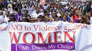 Women take part in a protest along a main street in the Kenyan capital of Nairobi (17 November 2014)
