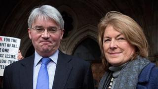 Andrew Mitchell and his wife Dr Sharon Bennett arrive at the High Court on 24 November
