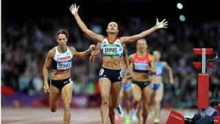 Jessica Ennis celebrates after winning the final event in the 2012 Olympic heptathlon in order to claim the gold medal